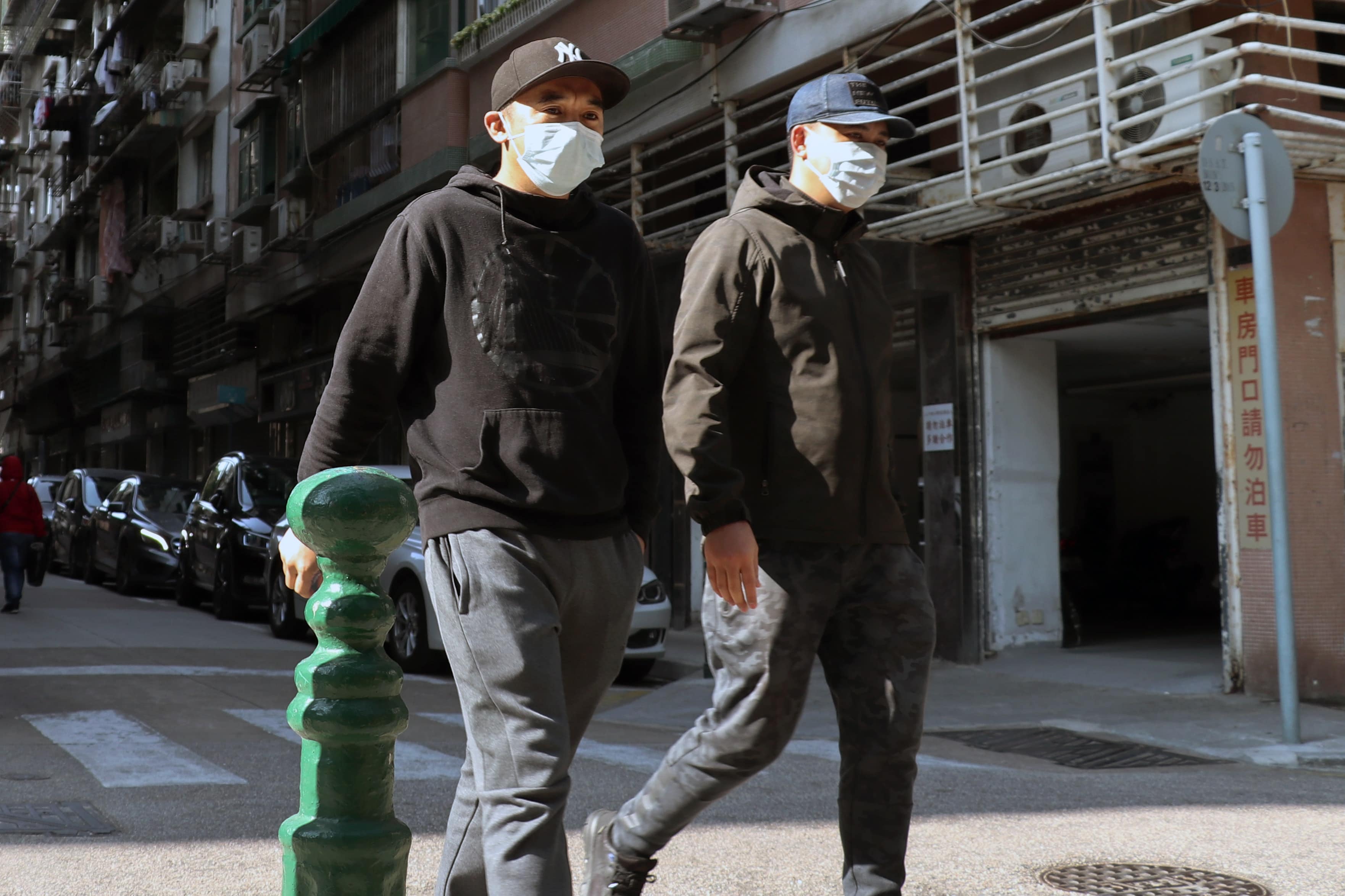 two men with face masks against coronavirus