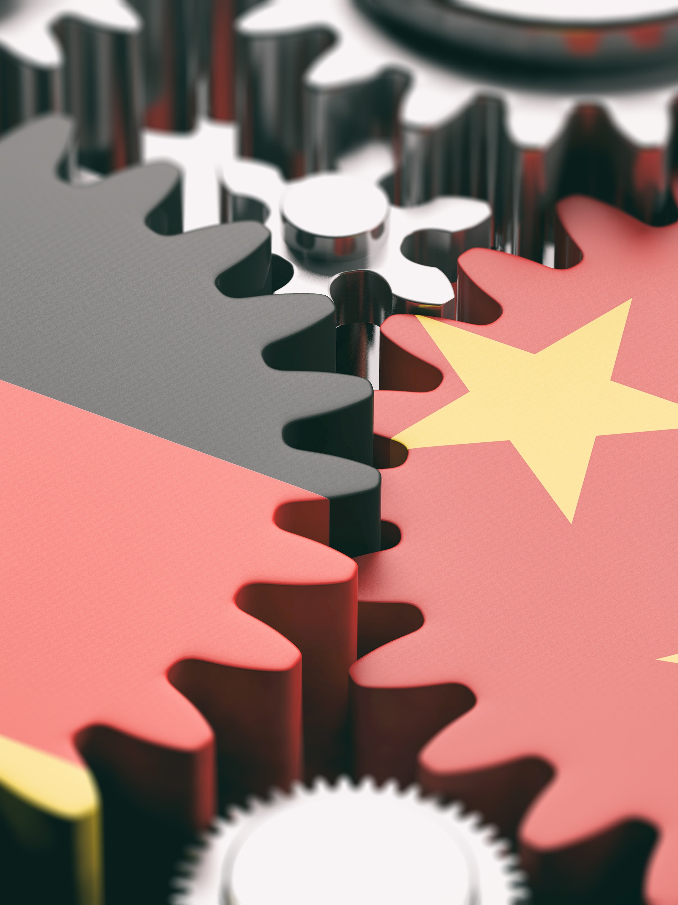 China and Germany flags on metal cogwheels. 3d illustration