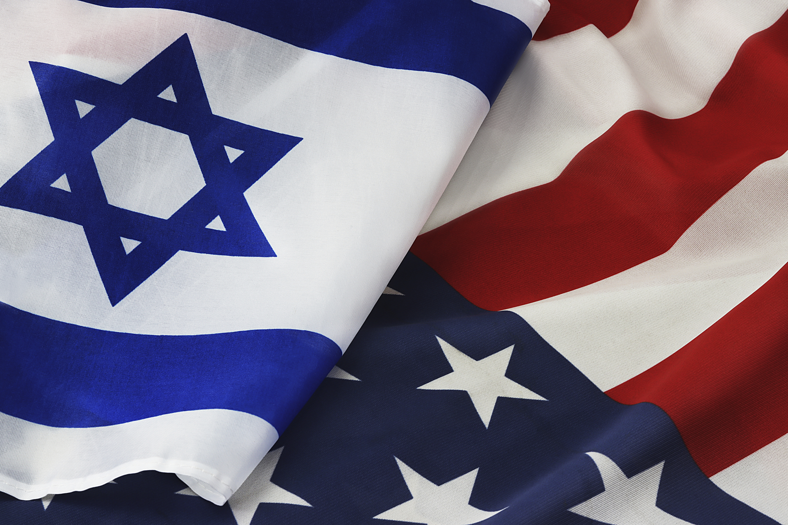 USA Israel. Photo American flag and Flag of Israel conveys the partnership between the two states through the main symbols of these countries.